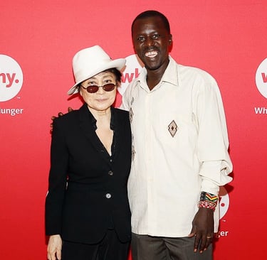 CEA Hope North Founder Okello Sam with Yoko Ono.