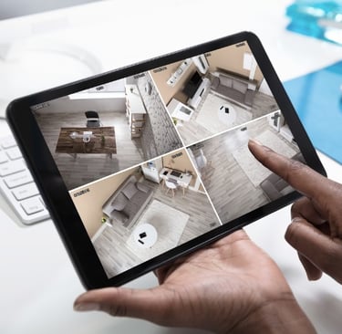 a person holding a tablet with a camera and a tablet