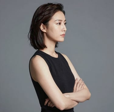 Medical professionals wearing surgical attire perform an operation in a dimly lit operating room. The focus is on the procedure, with surgical instruments and materials nearby.