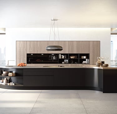 a kitchen with a large island style counter top