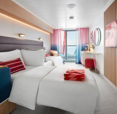 Modern luxury cruise ship cabin with white twin beds, private balcony, and wooden wall paneling.