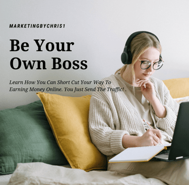a woman sitting on a bed with a laptop and headphones studying to be her own boss