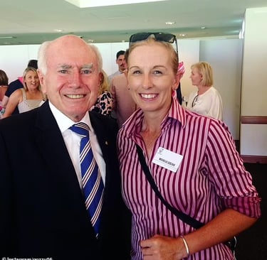 Michelle Goszko with the Australian Prime Minister John Howard