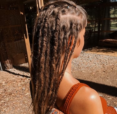 a woman with dreadlocks
