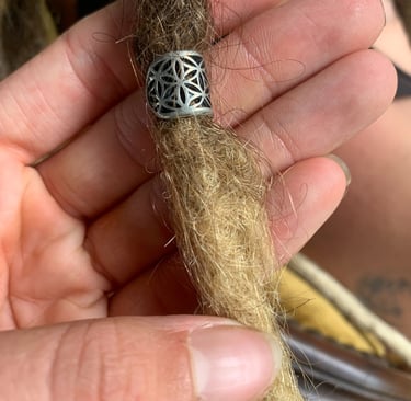 a dreadlock with a bead