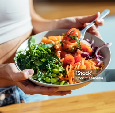 a young lady eating healthy food