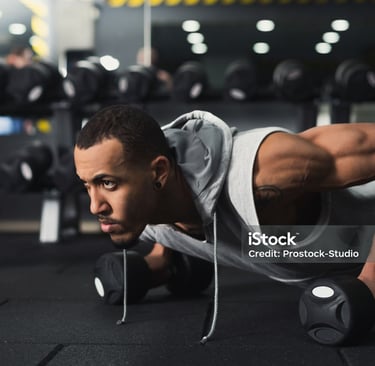 a man doing push ups in a gym
