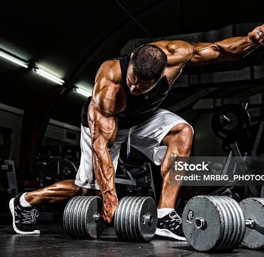a man holding a dumbbell