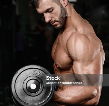 a man with a dumbbell in his hand