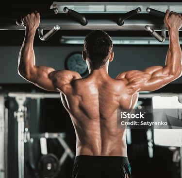 a man doing pull ups on a pull up barbell