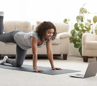 a woman getting online training at home