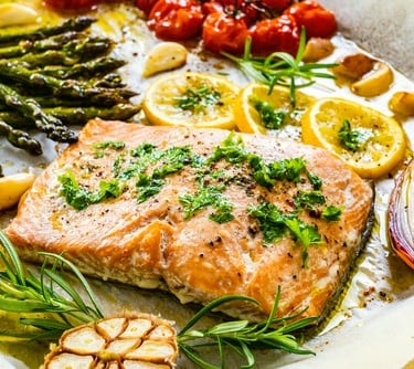 Salmon and vegetables on a baking sheet