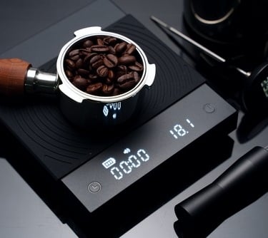 a coffee grinder with coffee beans on a scale