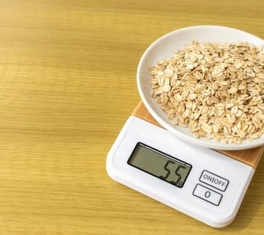 a bowl of oatmeal on a scale