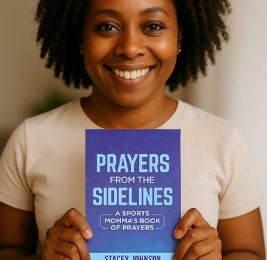 Sports mom holding Prayers from the Sidelines designed for encouragement for moms