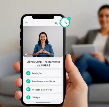 celular na mão aberto na pagina de treinamento de Libras relógio marca hora que pode estuda