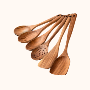 Set of six wooden kitchen utensils, including spoons and spatulas, arranged in a fan pattern.