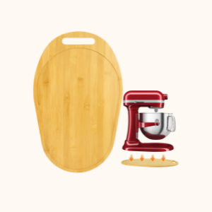 A bamboo cutting board, a red stand mixer with a silver bowl