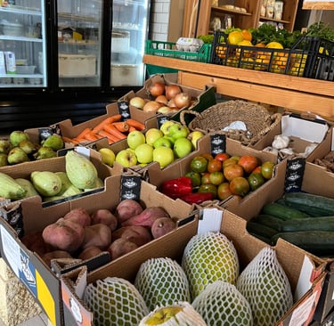 Bencomo Coliving supports local businesses, such as Casa Verde. The photo shows fruits and veggies.