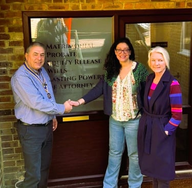 Claire Nash and Samantha Norgate with Rotary President Ken Maynard outside Claire Nash Solicitors Cr