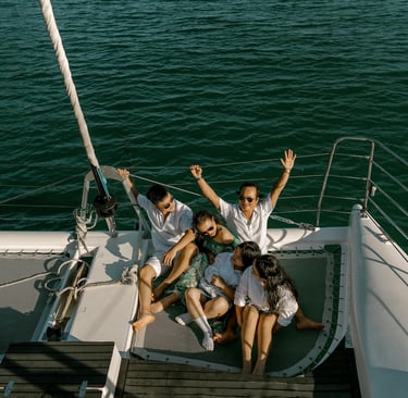 a group of people sitting on a boat
