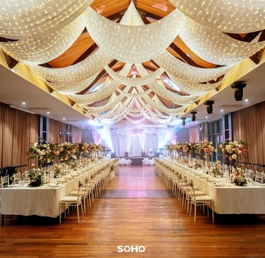 a large room with a long table and chairs