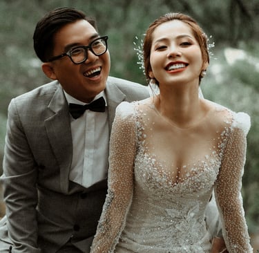 a man and woman are smiling and laughing