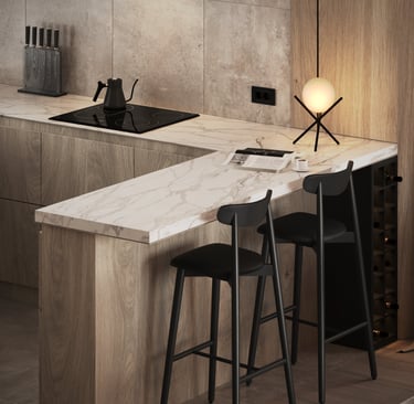 a kitchen with a marble counter top and bar stools