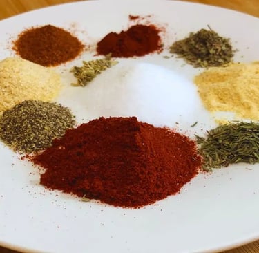 blackened seasoning on white plate in a circle