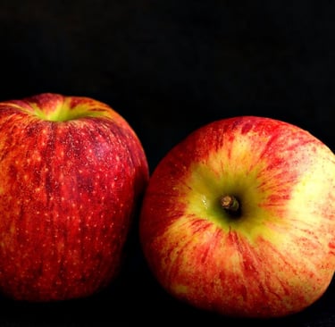 fuji apples with black background