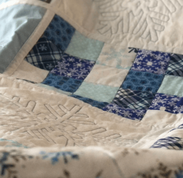 snowflake lap quilt