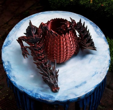Dragón flexible y su huevo impresos en 3D