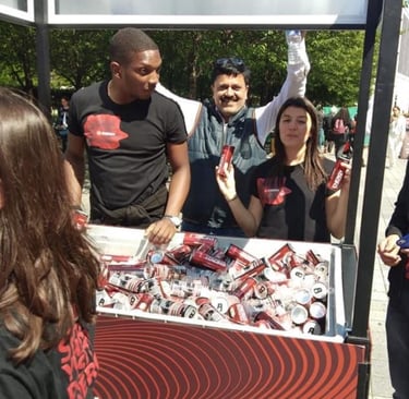 a man and woman standing in front of a sign