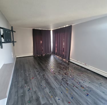 a room with a tv and a tv screen whit good space to make a private room
