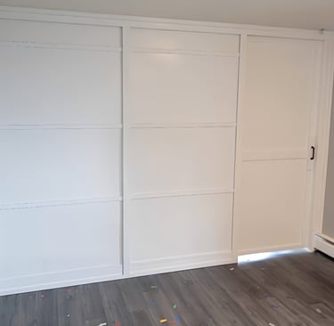 room dividers and sliding door a room with a white closet and a white closet