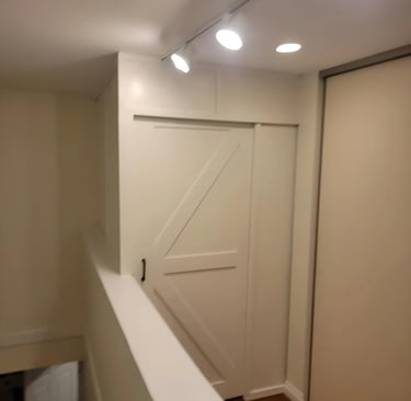 a white door with a white door and a white door