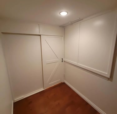 a cozy private room with a sliding door and a sliding door