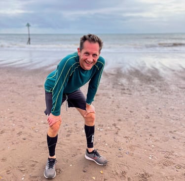 Marcus grinning after finishing run on beach