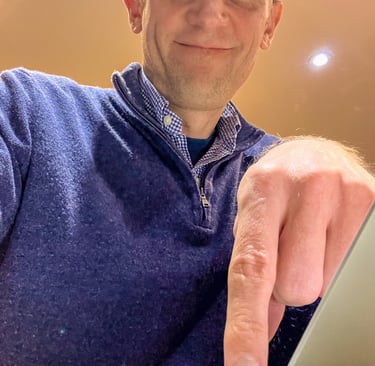 Marcus pressing off button on computer