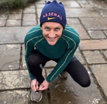 Marcus lacing up running shoes