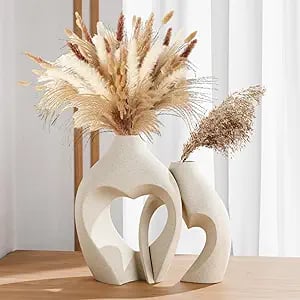 decorative Accessories: Minimalist white vase for simple and elegant bedroom decoration.