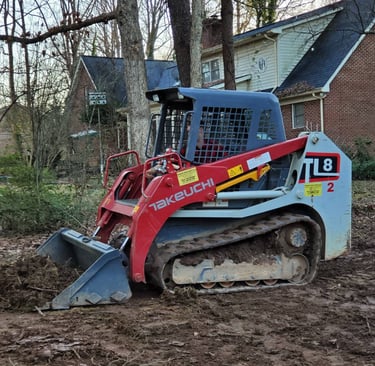 Skid Steer grading and land clearing by Storm Valley Landscape