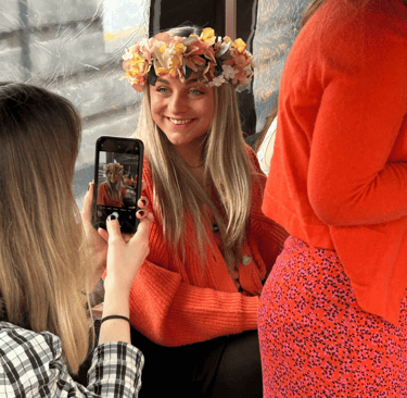 woman showing off her handmade flower crown