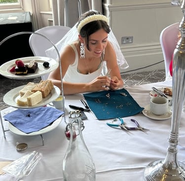 bride making earrings at a jewellery making hen party