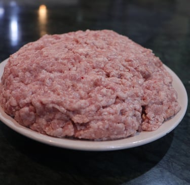a plate of kheema with a large amount of meat