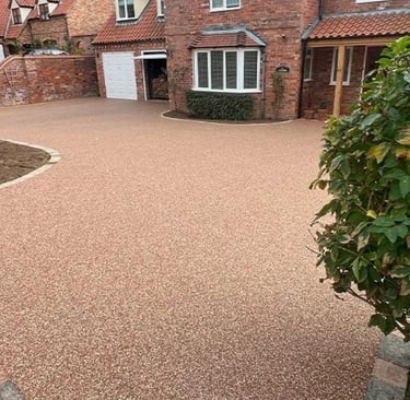 a driveway with a driveway and driveway with a driveway