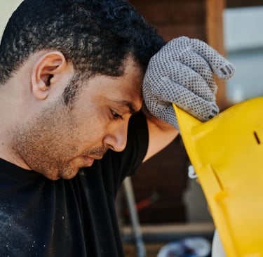A tired looking services business worker who is missing jobs Photo by Mikael Blomkvist