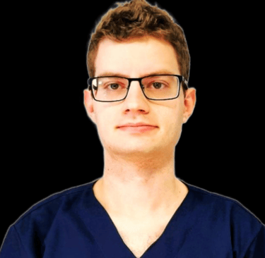 a man in a blue shirt and glasses