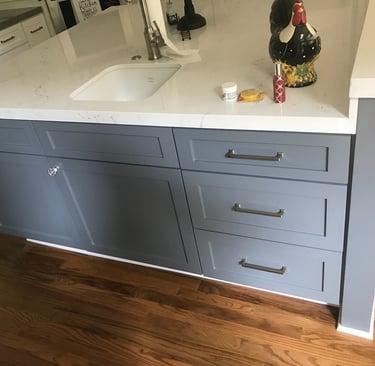 newly painted blue kitchen cabinets.