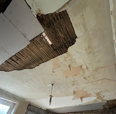 This wattle and daub ceiling needed completely overboarding.